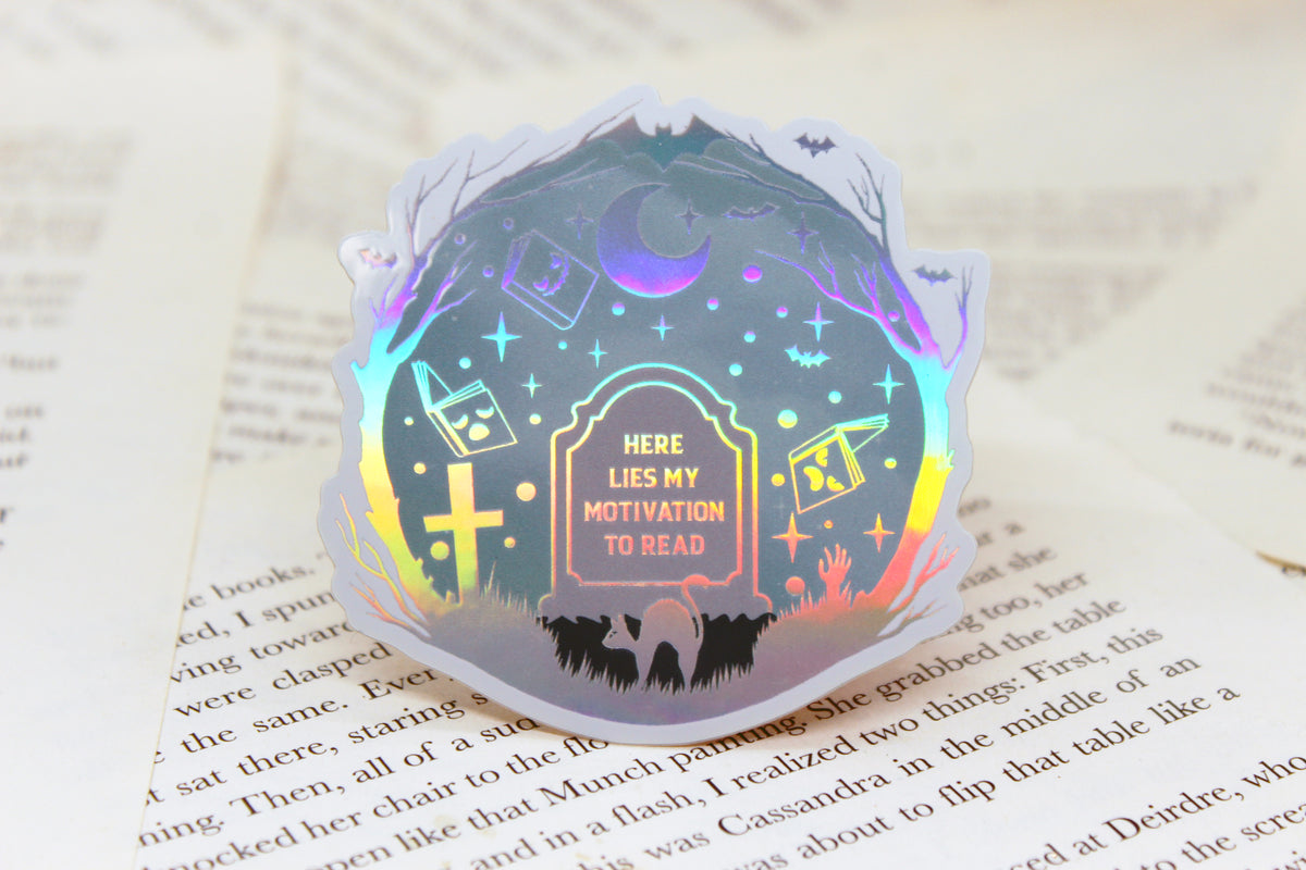 Holographic 'Here lies my motivation to read' – Bookish reading slump Waterproof vinyl decal