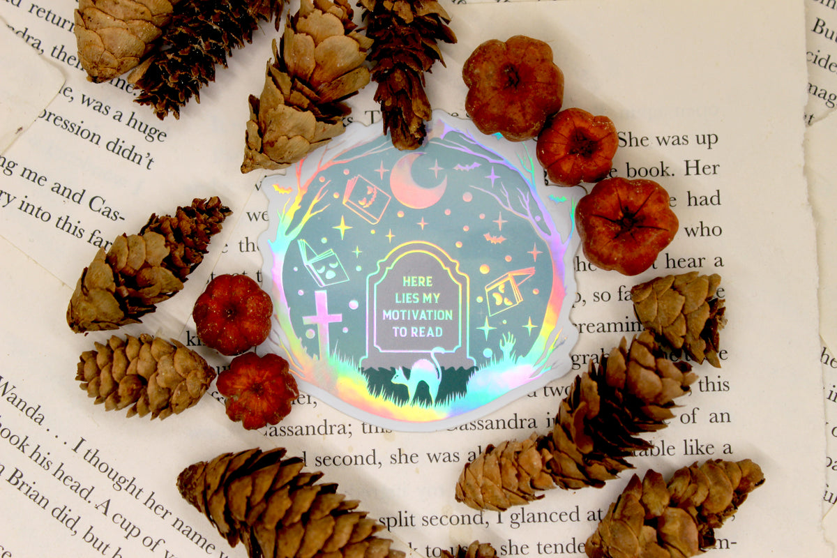 Holographic 'Here lies my motivation to read' – Bookish reading slump Waterproof vinyl decal
