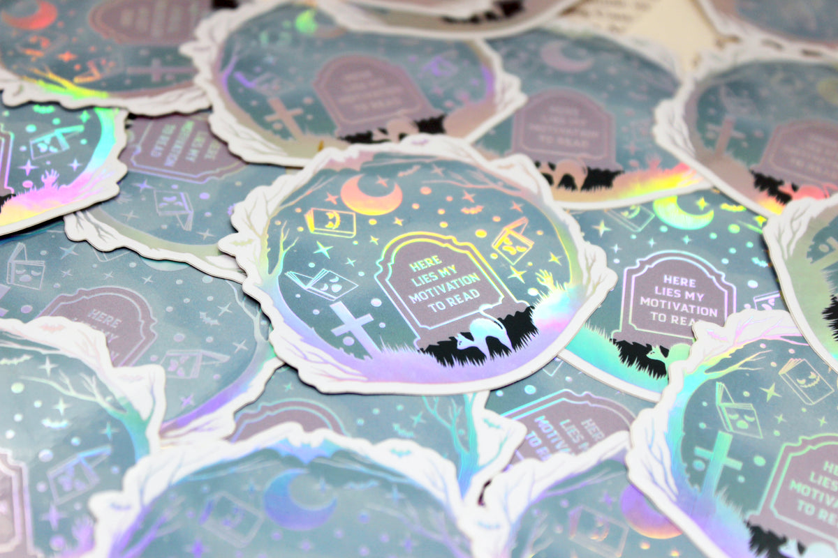Holographic 'Here lies my motivation to read' – Bookish reading slump Waterproof vinyl decal