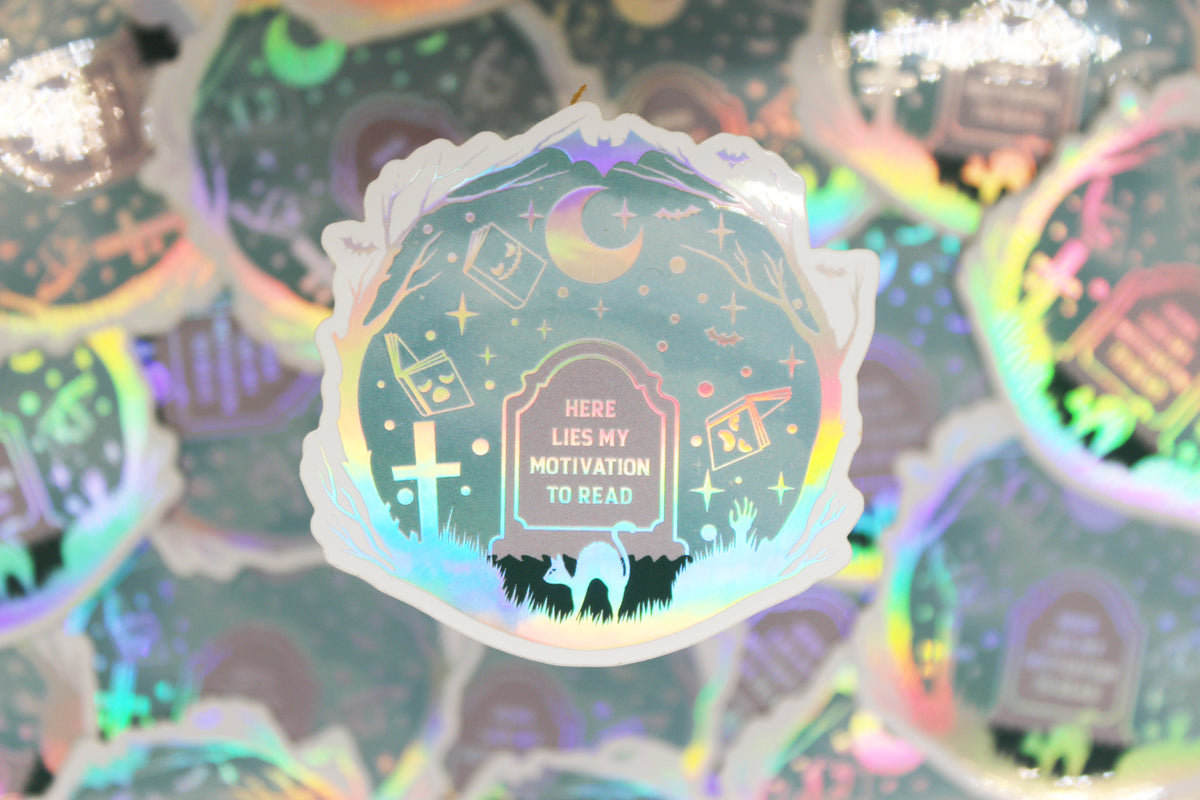 Holographic 'Here lies my motivation to read' – Bookish reading slump Waterproof vinyl decal